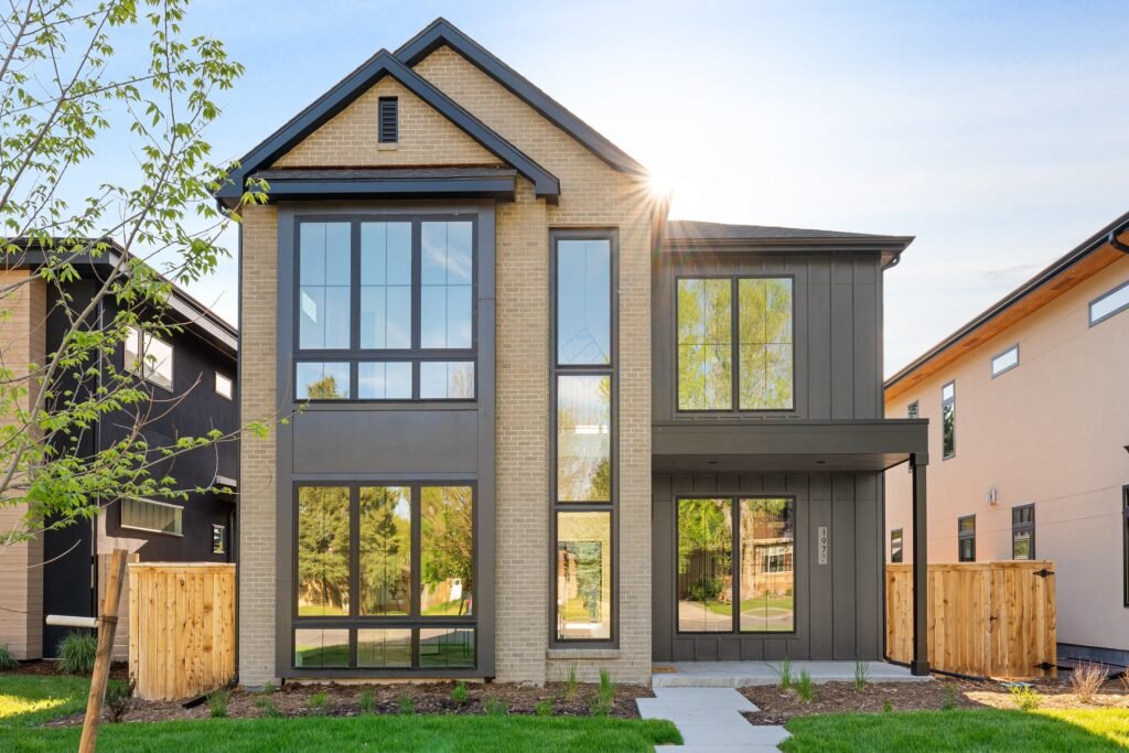 Modern home exterior with large windows. Click to order a Residential Listings Package for professional real estate photography.