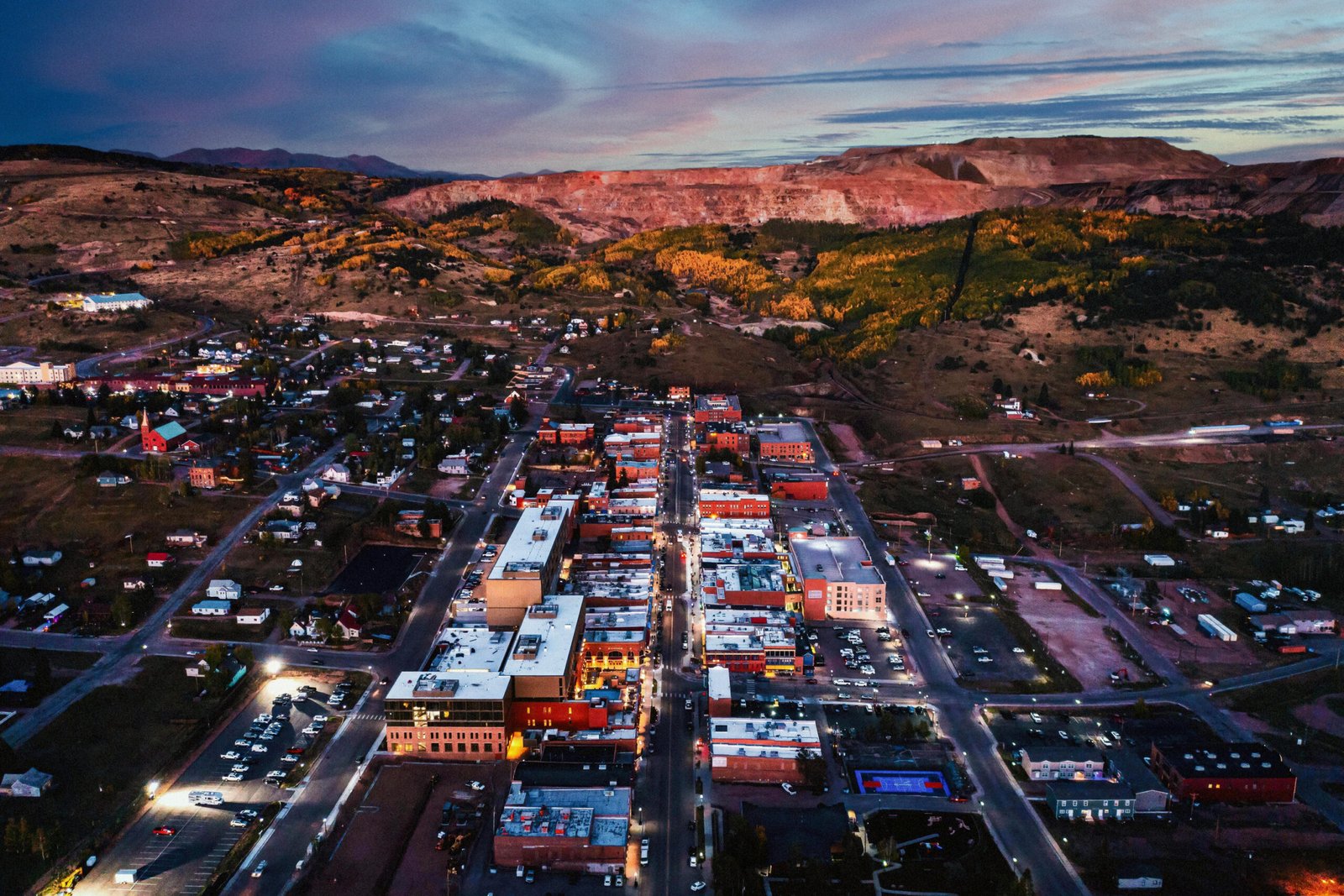 Denver hotel photographer captures hotels in Cripple Creek like St. Nicholas Hotel using drone photography at twilight, showcasing historic charm and haunting elegance.